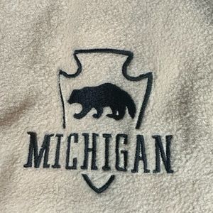 Michigan State fleece zip front vest with zip closure pockets